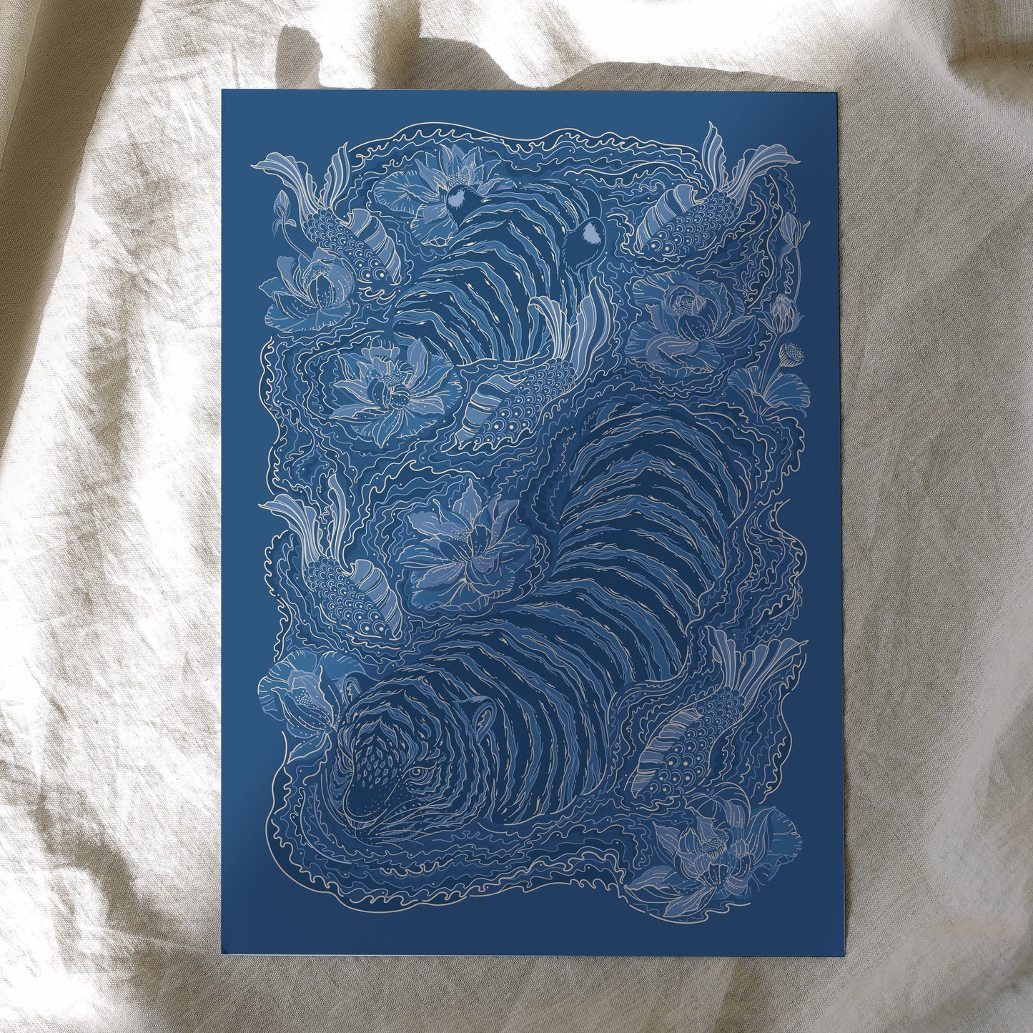 Blue and white intricate design of a tiger on a textured fabric background