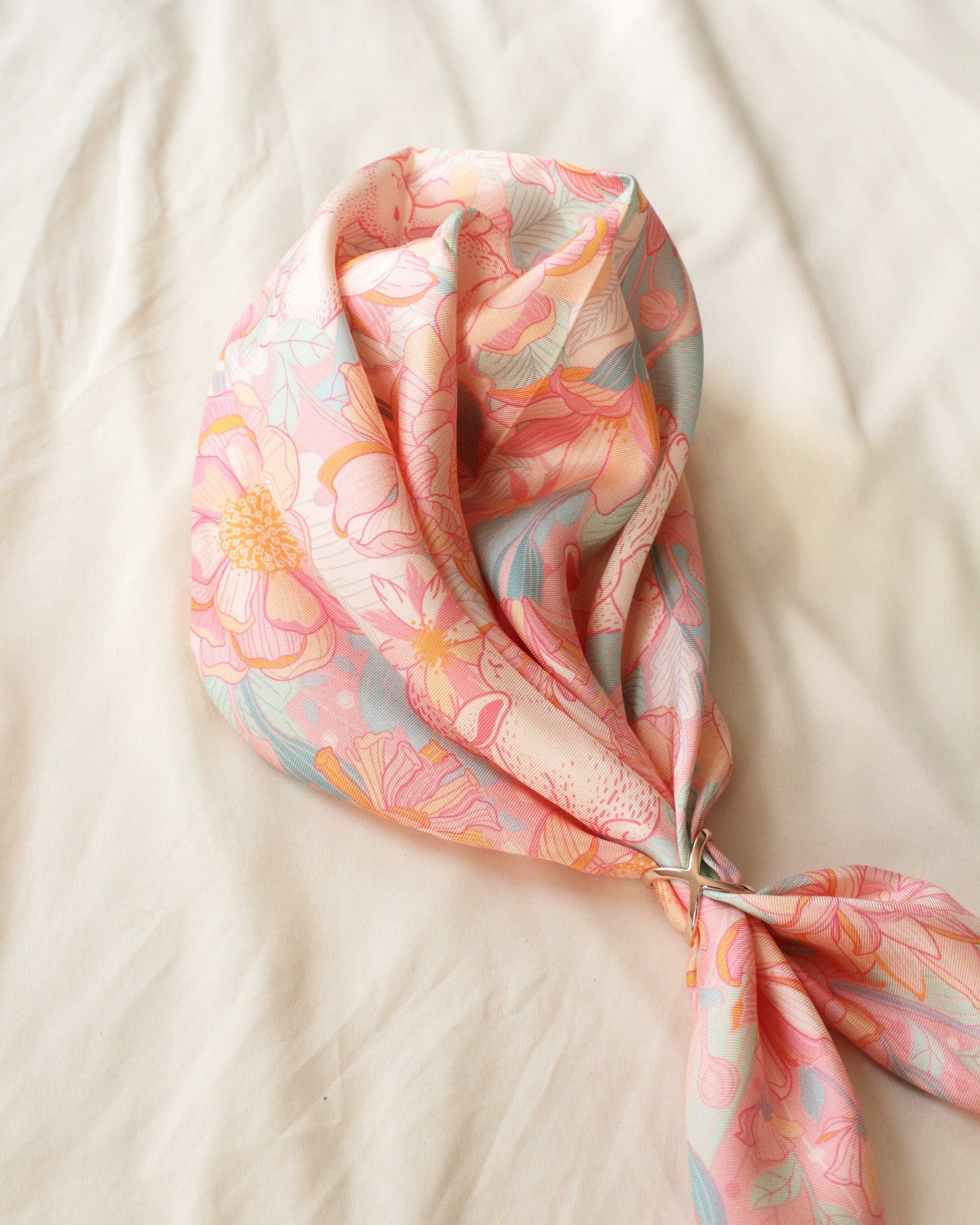 Bunny in the Floral Breeze Silk Twill Scarf with colorful floral design, perfect for hair or bag decoration.