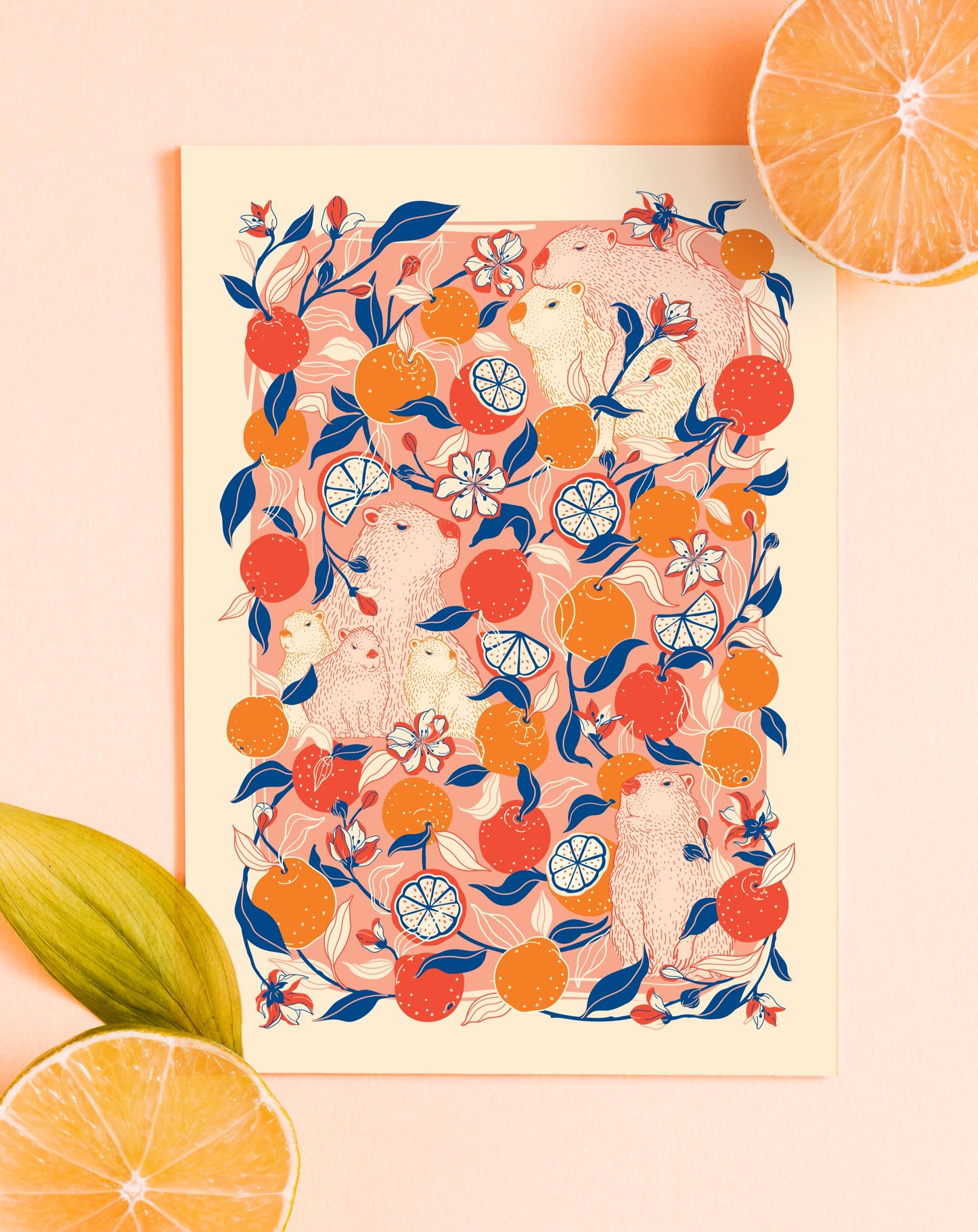 capybara with a yuzu orange pattern on a pink background with lemon slices