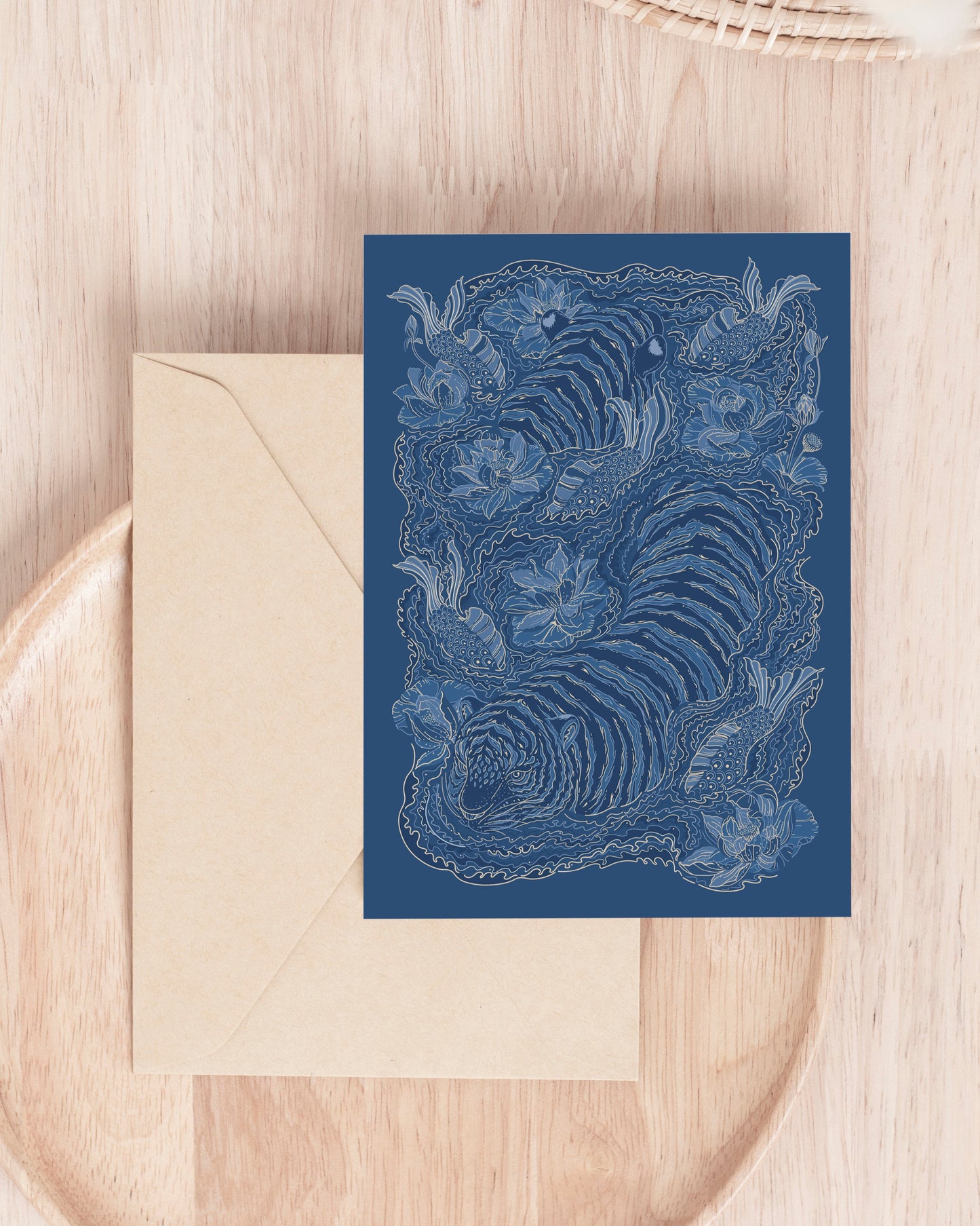 Blue tiger card with intricate design on a wooden surface