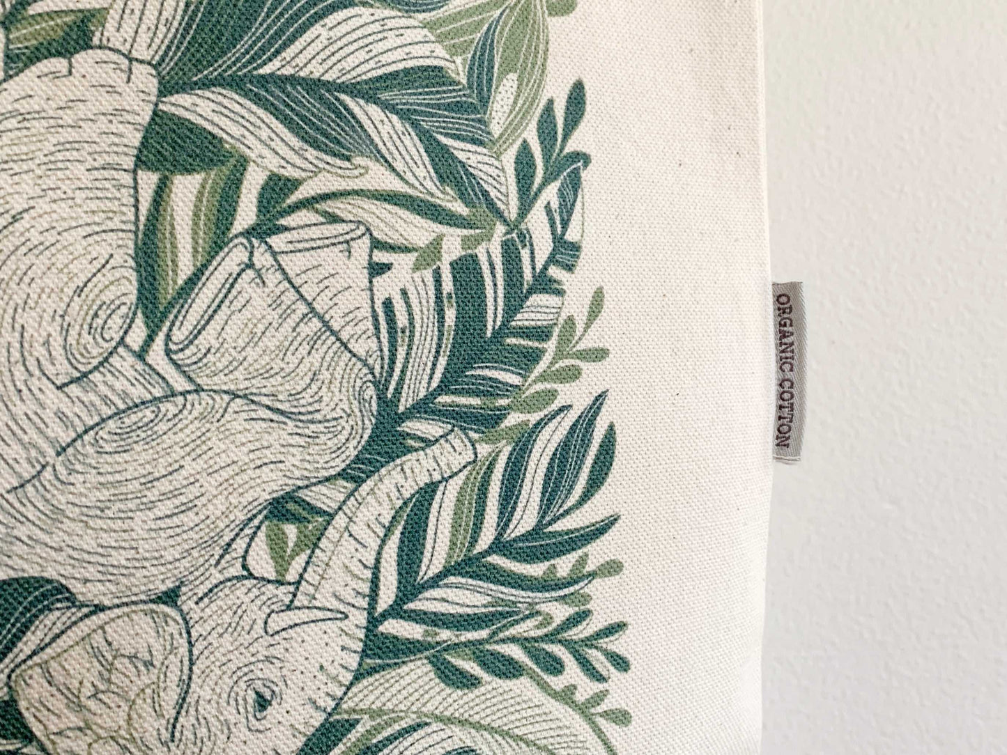 Detail of Elephant "Siesta" Canvas Tote Bag featuring beautiful elephant artwork and organic cotton label.