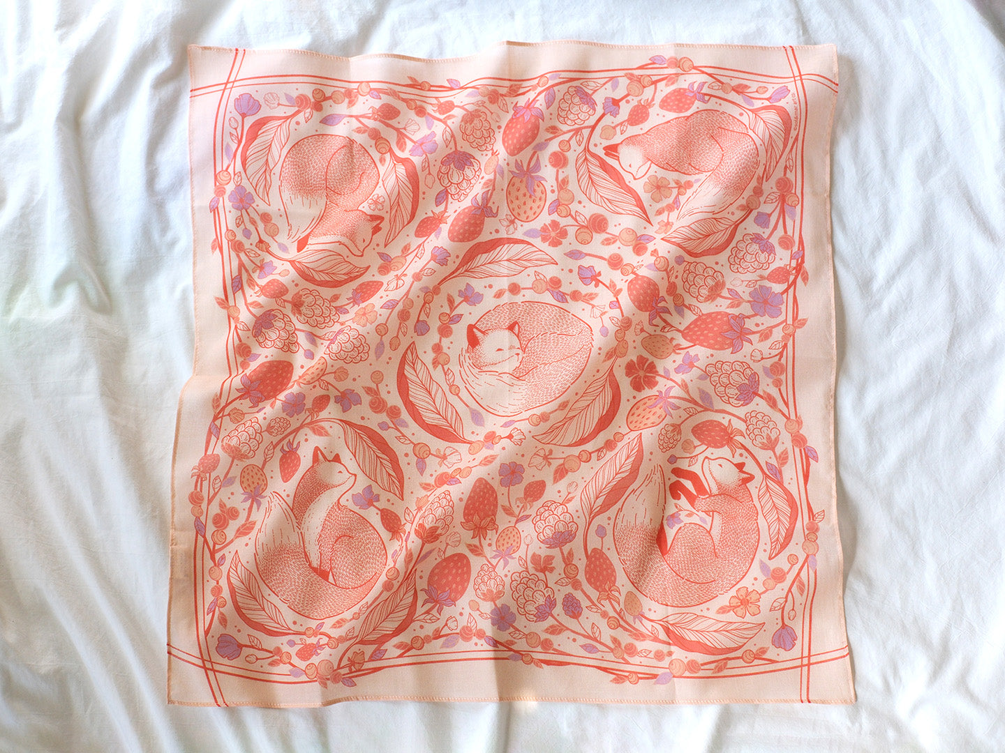 Fox&Berry blush bandana scarf featuring illustrations of red foxes and berries, perfect for accessories or decor.