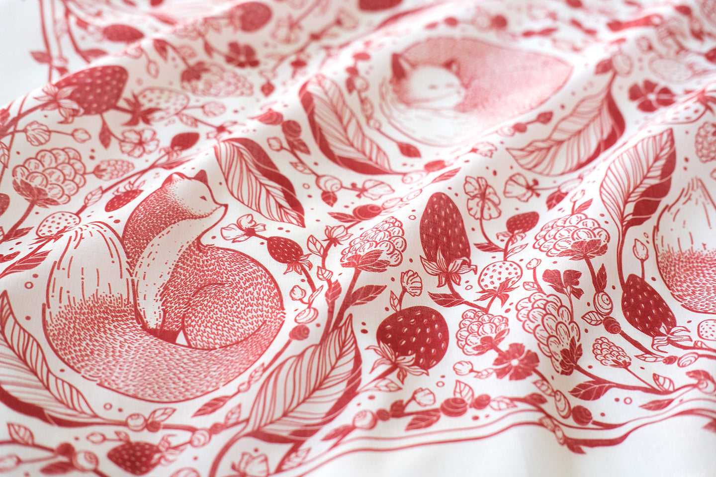 Fox&Berry Bandana Scarf in blush, featuring illustrated red foxes and berries on soft cotton fabric.