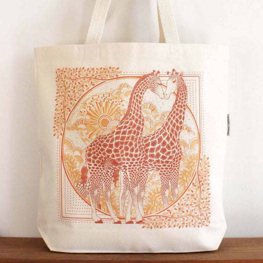 Giraffe family illustration on organic cotton canvas tote bag for stylish everyday use.