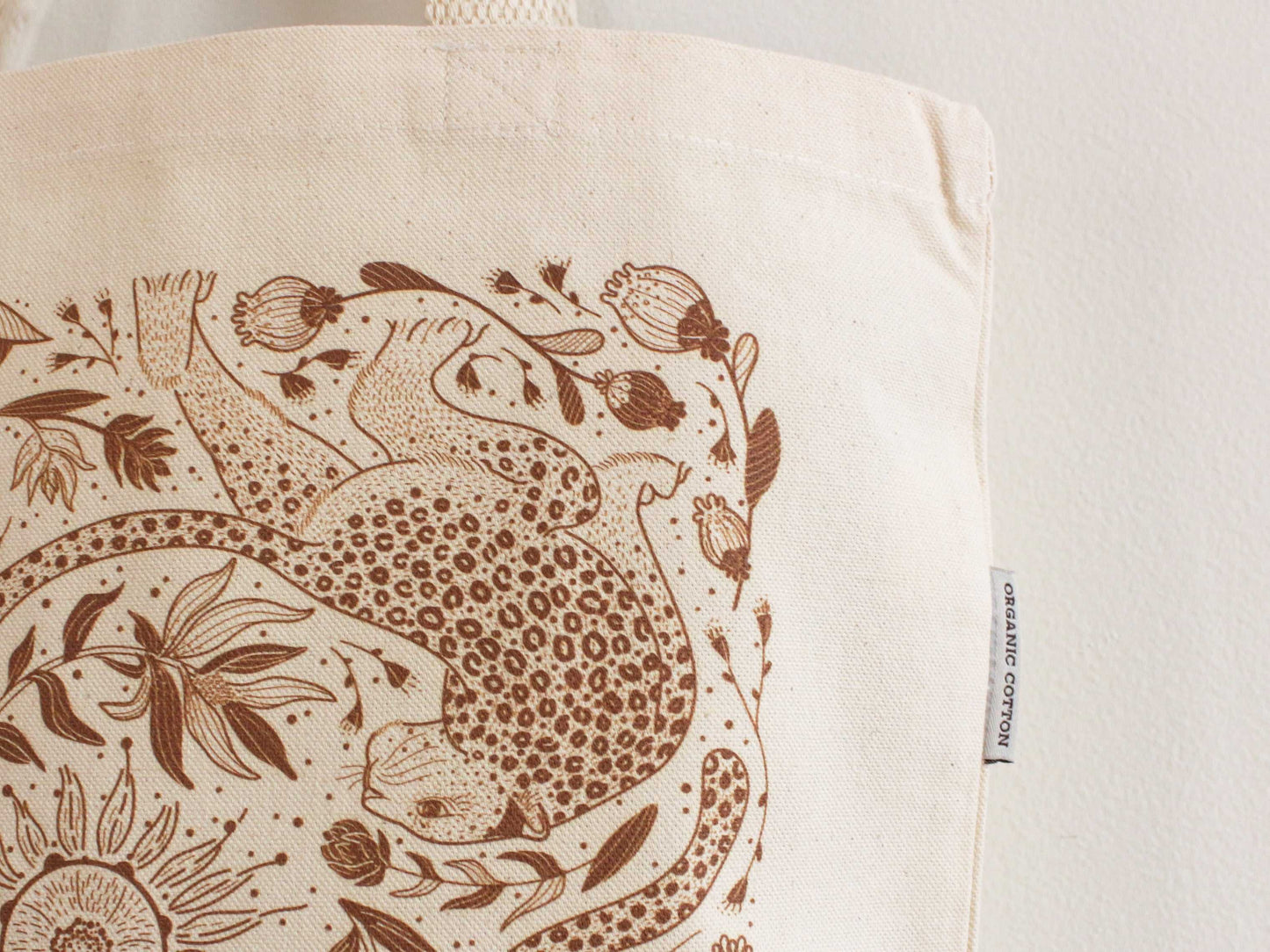 Leopard and Sun line art on organic cotton canvas tote bag, perfect for everyday use and stylish outings.