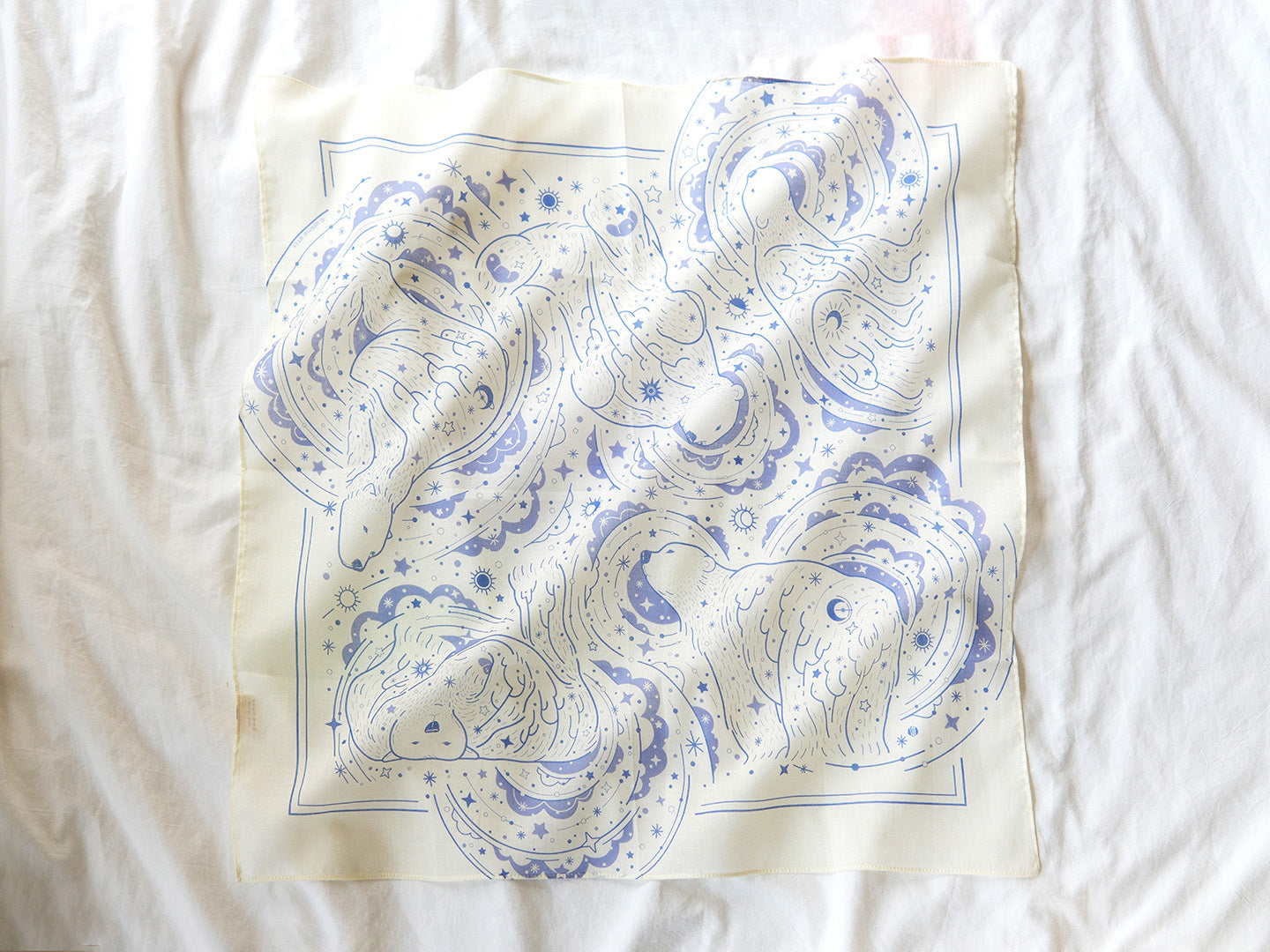 Polar Bear and Northern Sky design bandana scarf in off-white with soft blue art patterns.