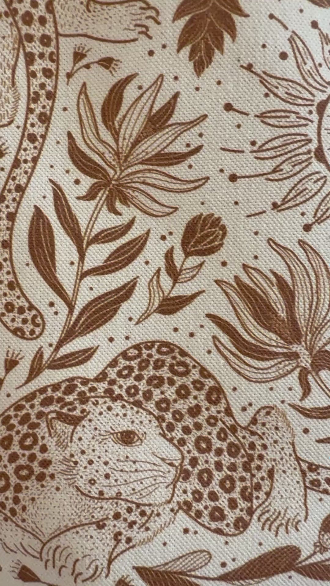 Close-up of Leopard and floral line art design on organic cotton canvas tote bag.