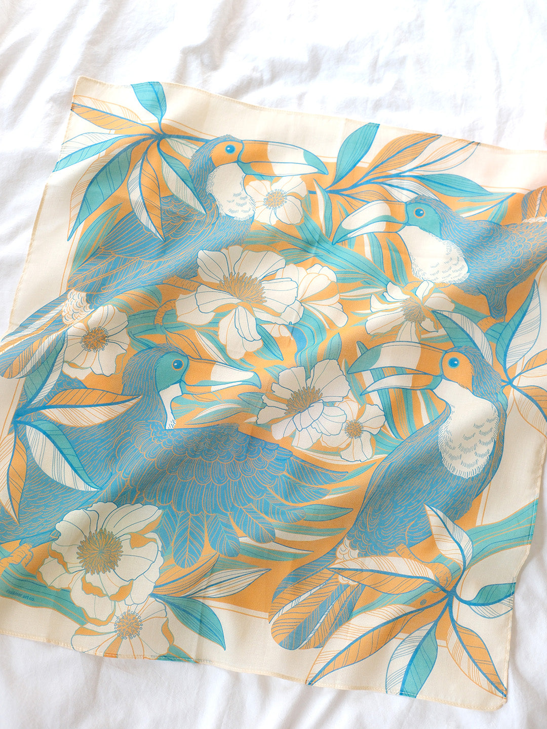 Toucan in Floral Jungle Bandana Scarf in yellow, featuring soft cotton and vibrant toucan artwork.