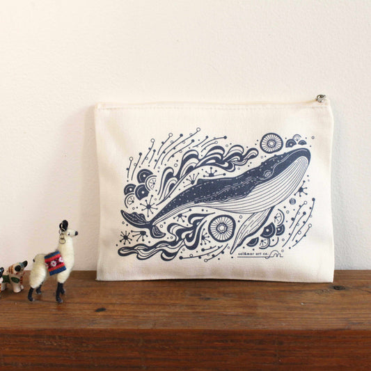 Canvas zipper pouch featuring a beautifully illustrated humpback whale swimming in ocean waves.