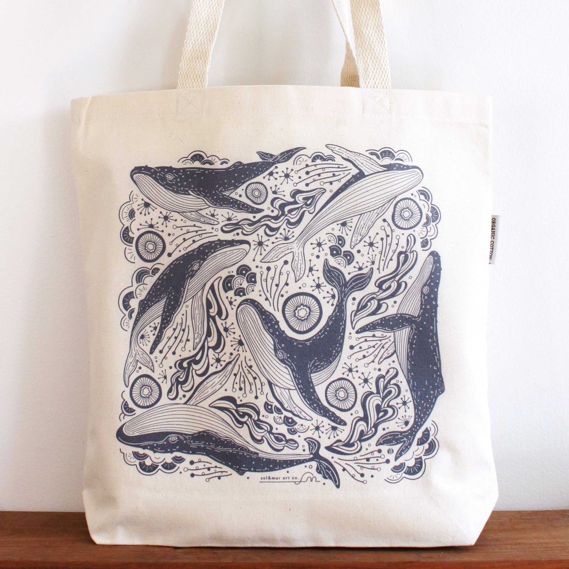 Whale and ocean art design tote bag made from organic cotton canvas, featuring Humpback whales.