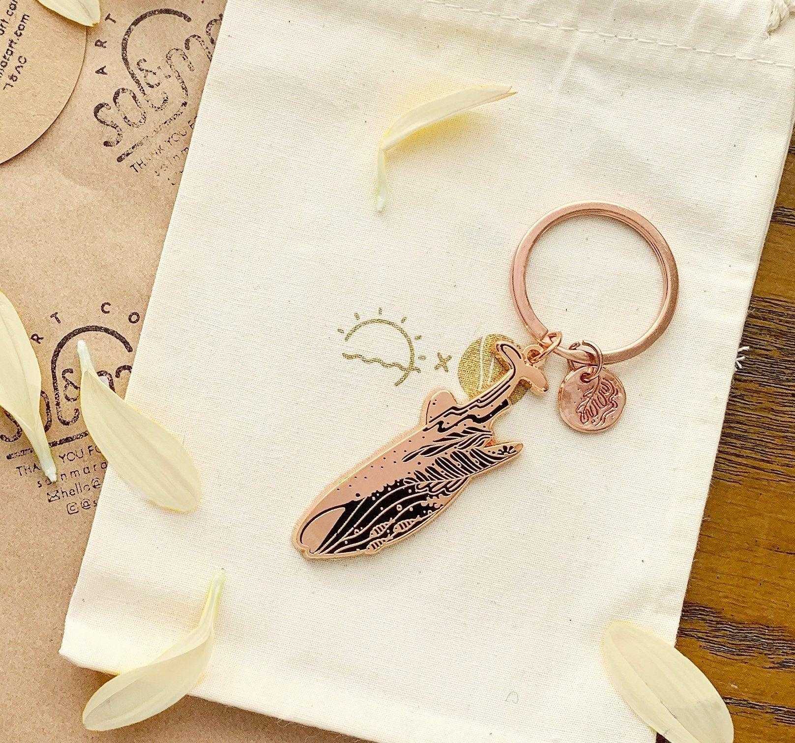 Whale Shark enamel keychain with habitat design and round tag, on eco-friendly display card.