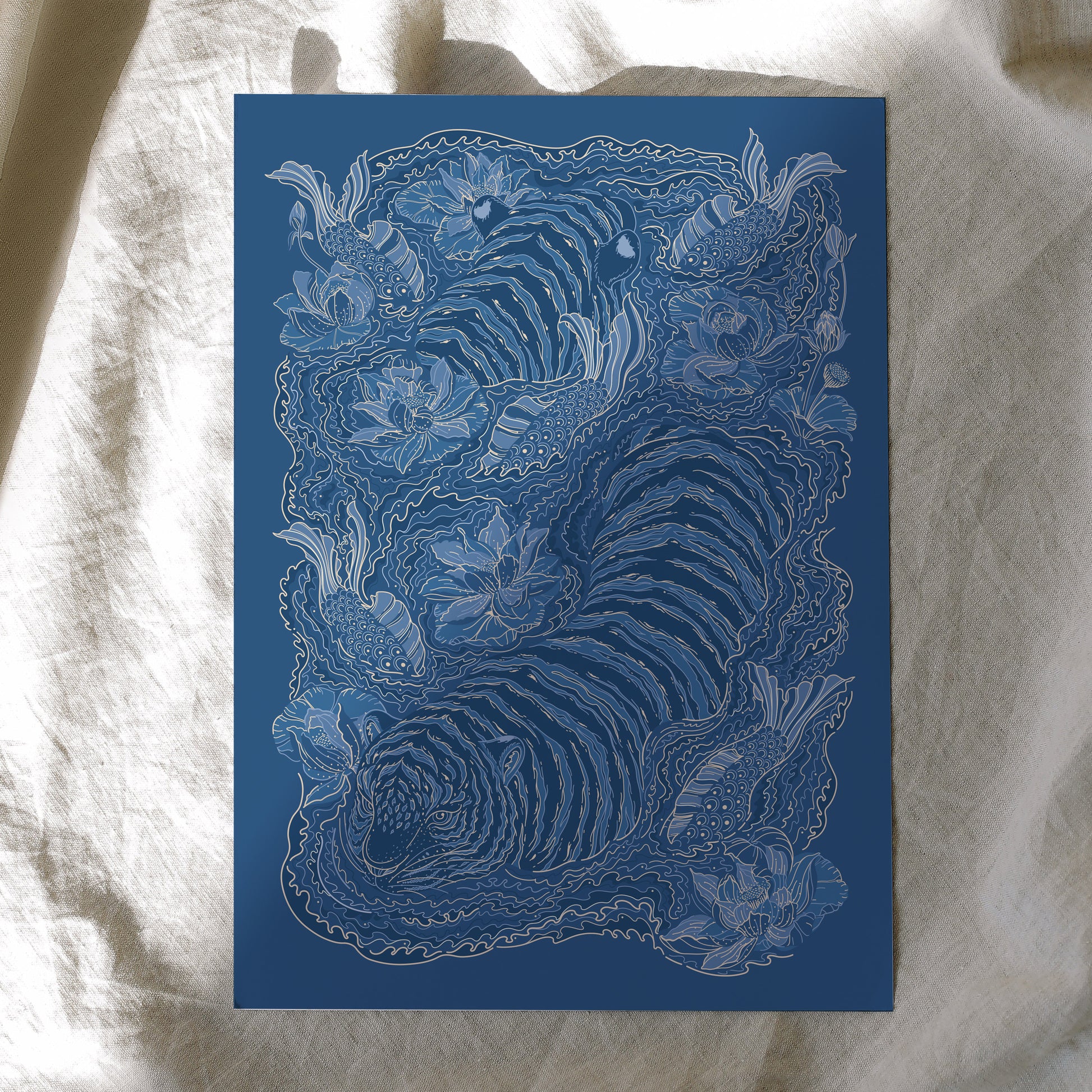 Blue and white intricate design of a tiger on a textured fabric background