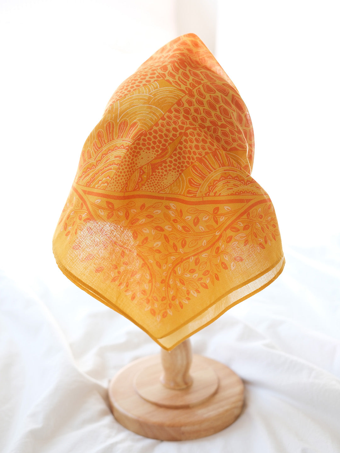Golden yellow bandana scarf featuring giraffe family illustration, perfect for hair, pets, or accessories.