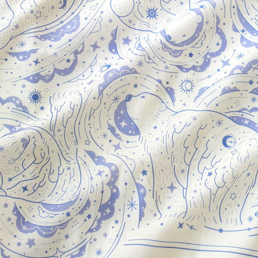 Off-white bandana scarf featuring a whimsical polar bear and northern sky design, perfect for accessories and décor.