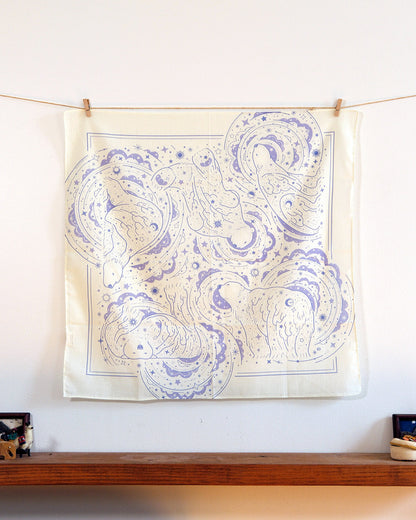 Polar Bear and Northern Sky design bandana scarf displayed on a wall, showcasing soft cotton art in off-white color.