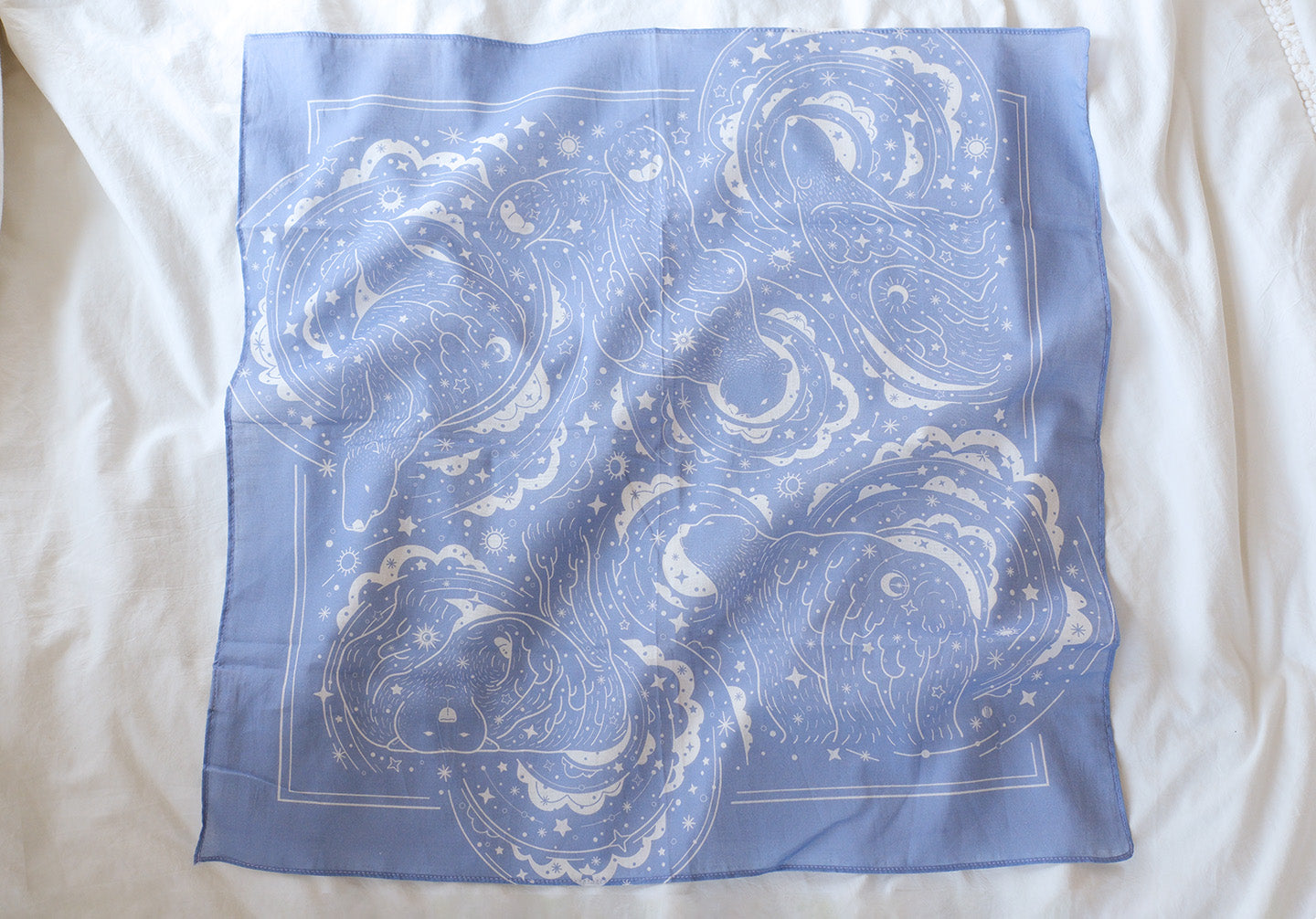Lavender bandana scarf featuring polar bear and northern sky design, perfect for accessories and decor.