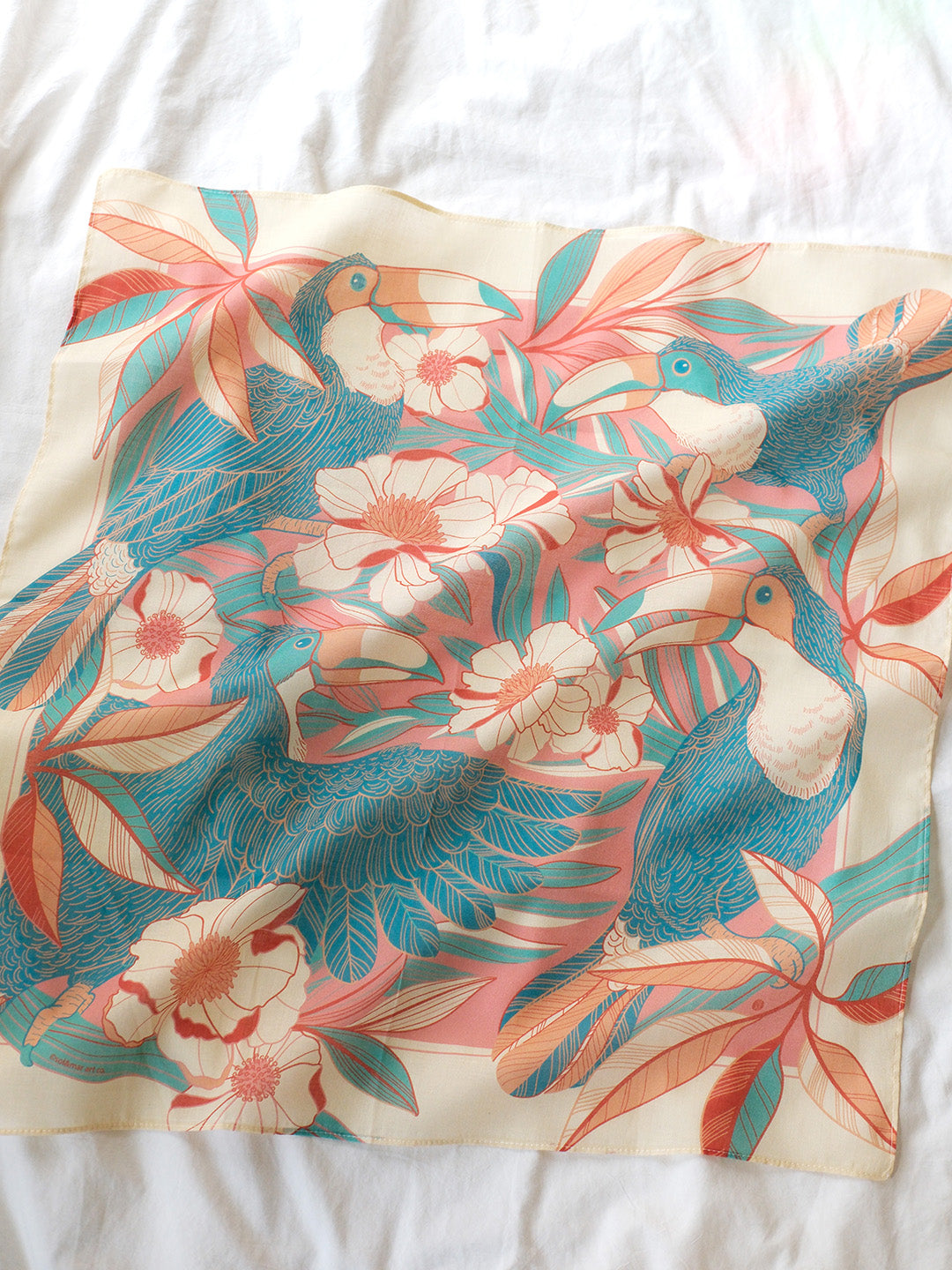 Toucan in the Floral Jungle bandana scarf in pink, featuring vibrant toucans and flowers, perfect for accessories and décor.