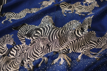 Fabric with zebra pattern on a blue background