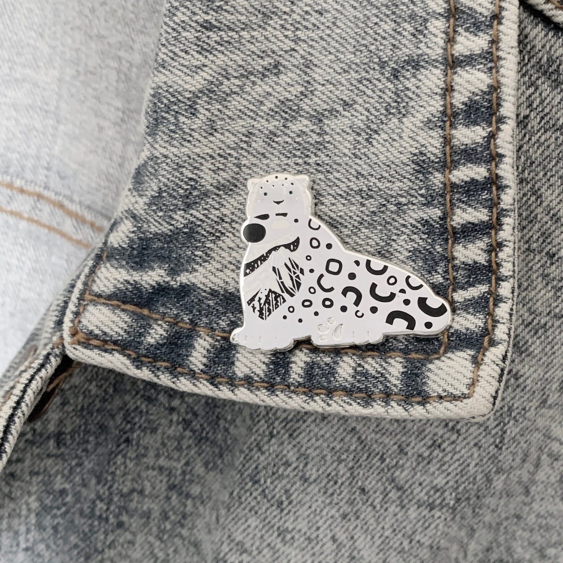 Snow Leopard enamel pin